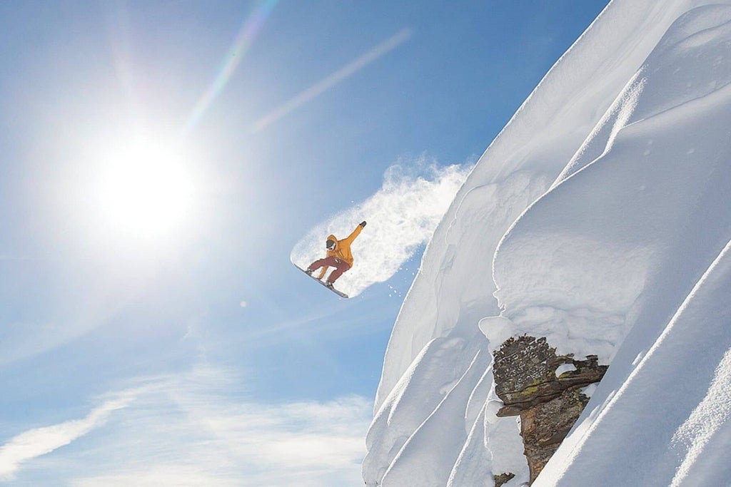 La Rosière- Jumping over a snow-covered mountain landscape