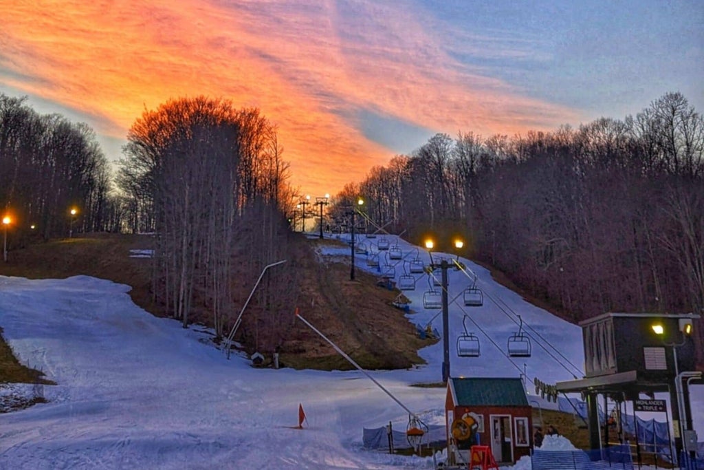 Mount Pleasant of Edinboro -  Sun sets behind the snowy mountains