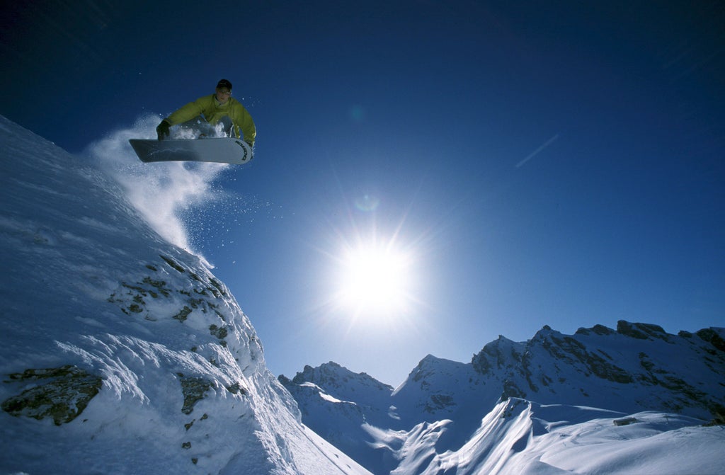 Snowboarder catching air at Amden, Switzerland.

Schneevergnuegen im Heidiland, © Ferienregion Heidiland