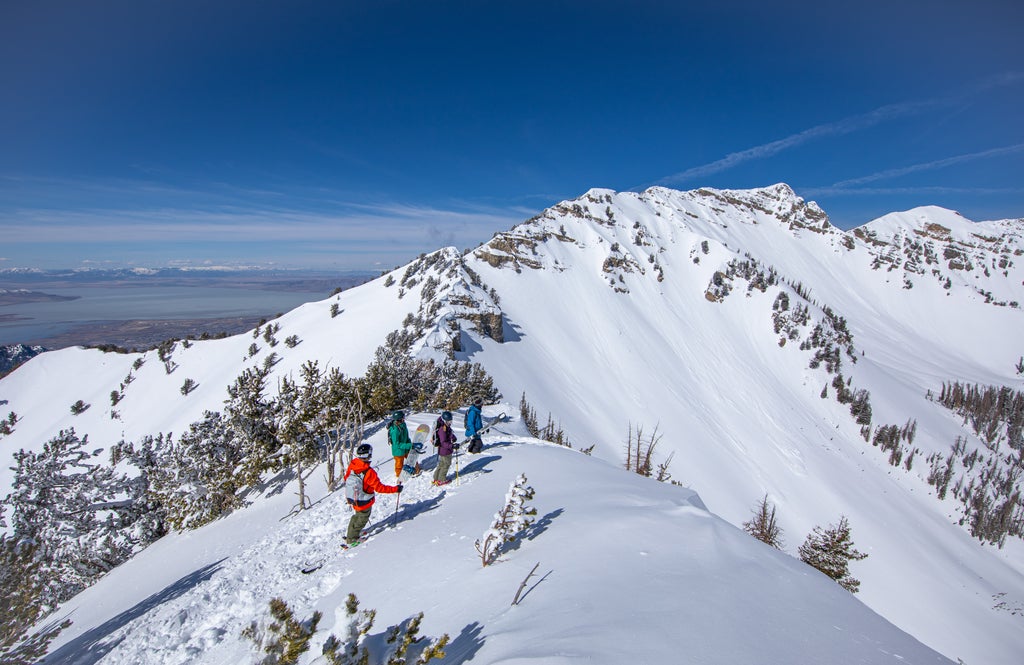 Snowbird_Powderbird Experience_Skiers on Mountain Ridge_(c): Noah Wetzel
