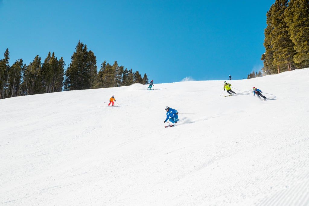 Breckenridge_Skiers on a sunny slope_(c): Aaron Dodds