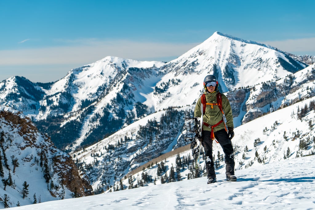 Snowbird_Powderbird Experience_Snowboarder on Mountain Top_(c): Snowbird