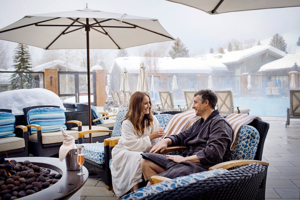 Sun Valley_Outdoor_Pool_Couple_(c): Sun Valley Resort Photographer: © Hillary Maybery