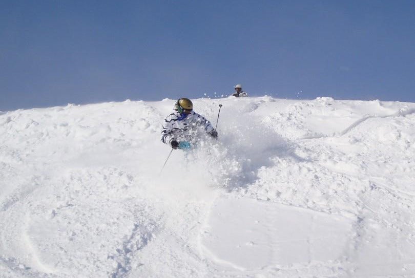 A skier finds a soft powder stash. Photo Courtesy of Winterplace Ski Resort.