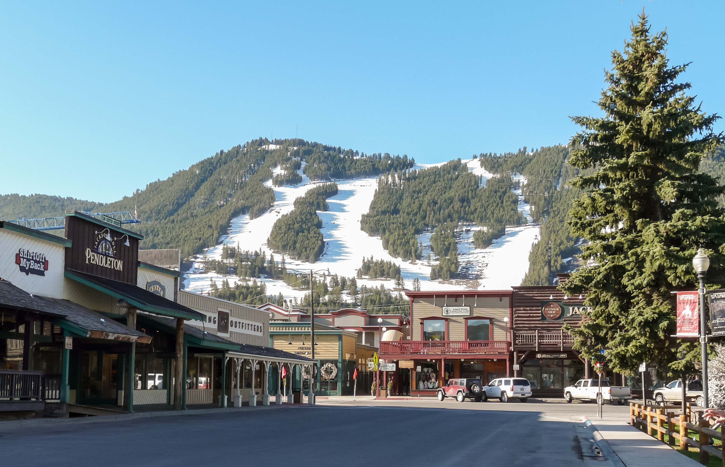 Jackson Hole town at sunset, lights, WY.
