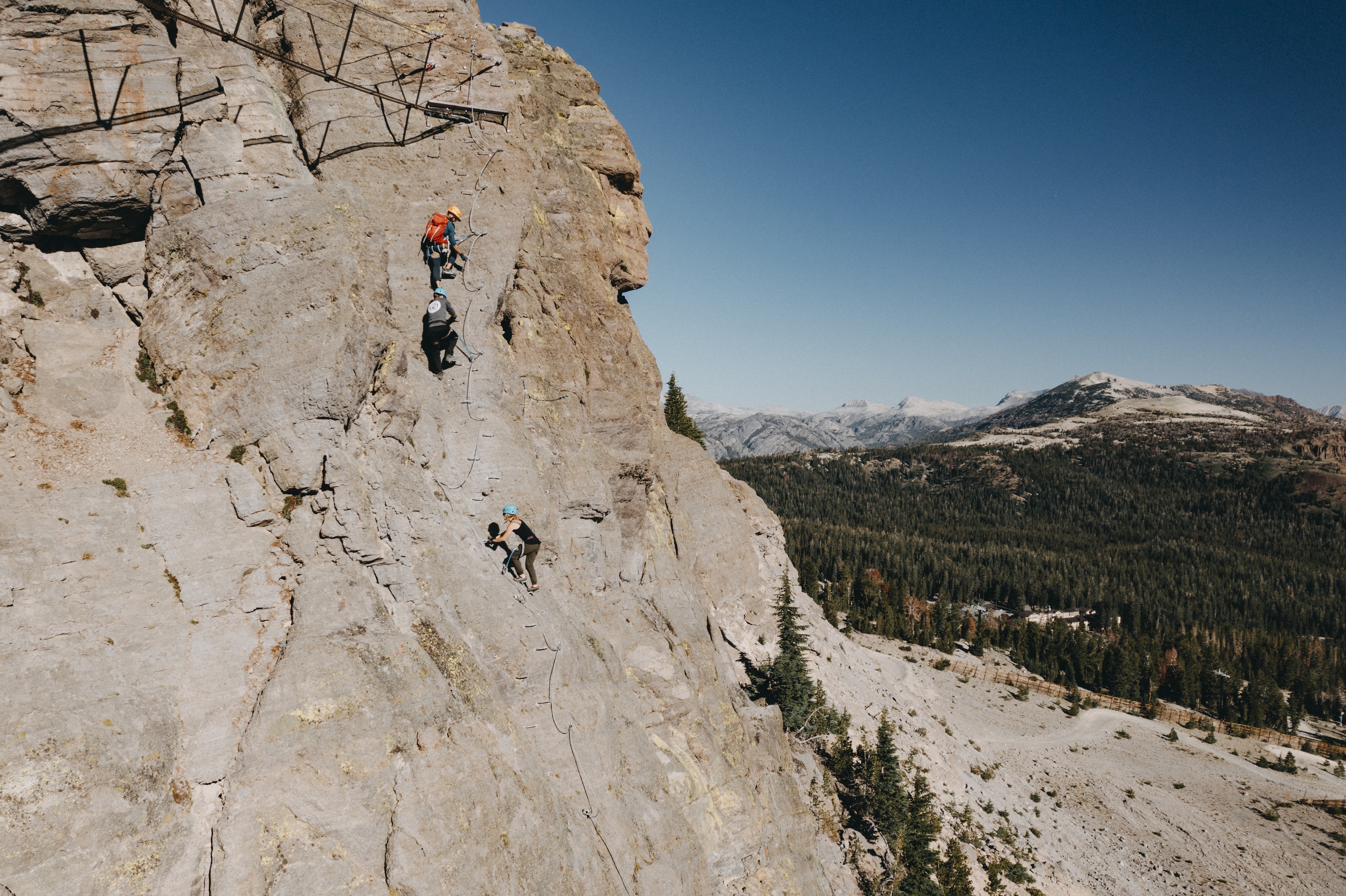 Group of people climbing up Mammoth Mountain Via Ferrata