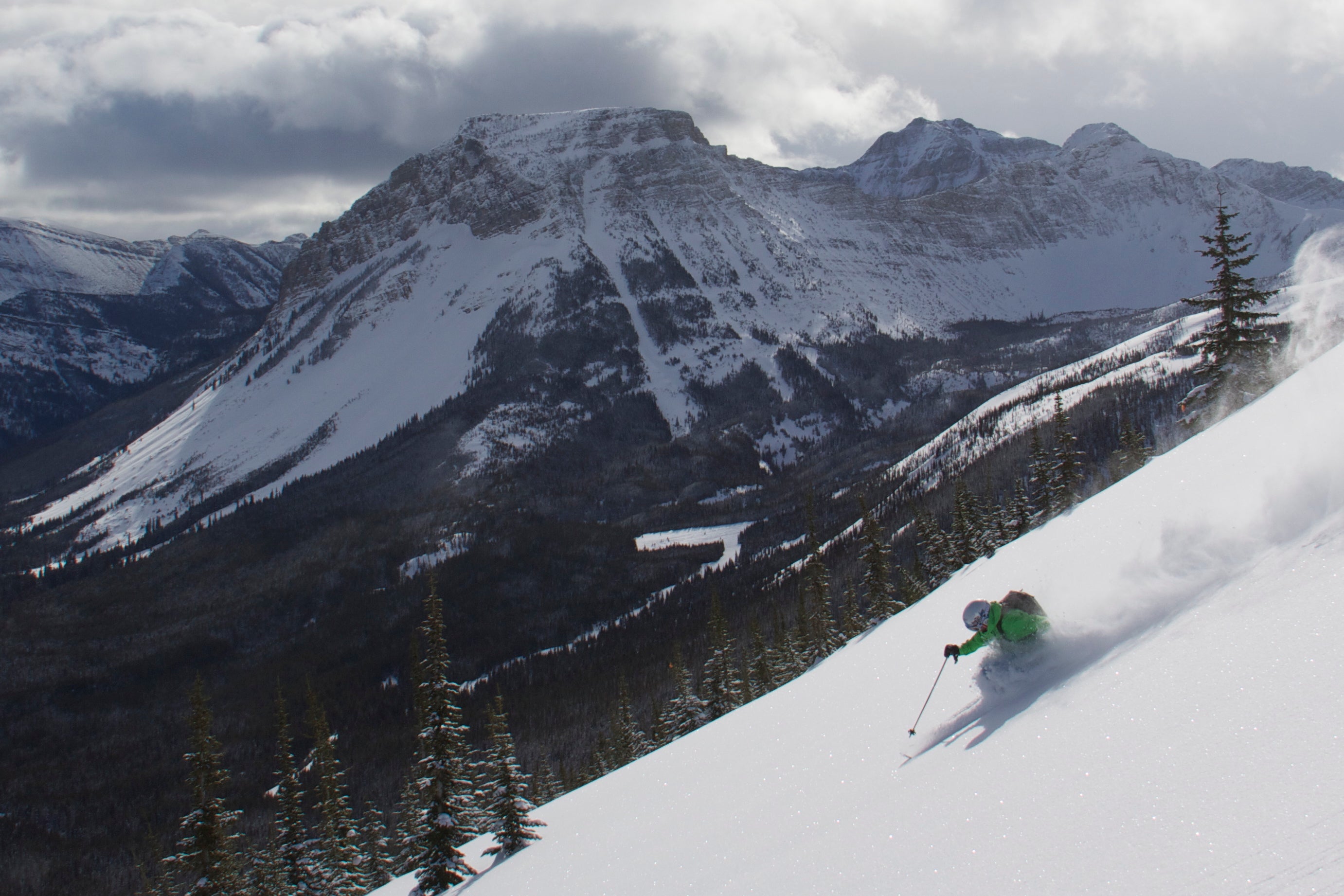 Skiing through untouched powder at Castle Mountain ski resort