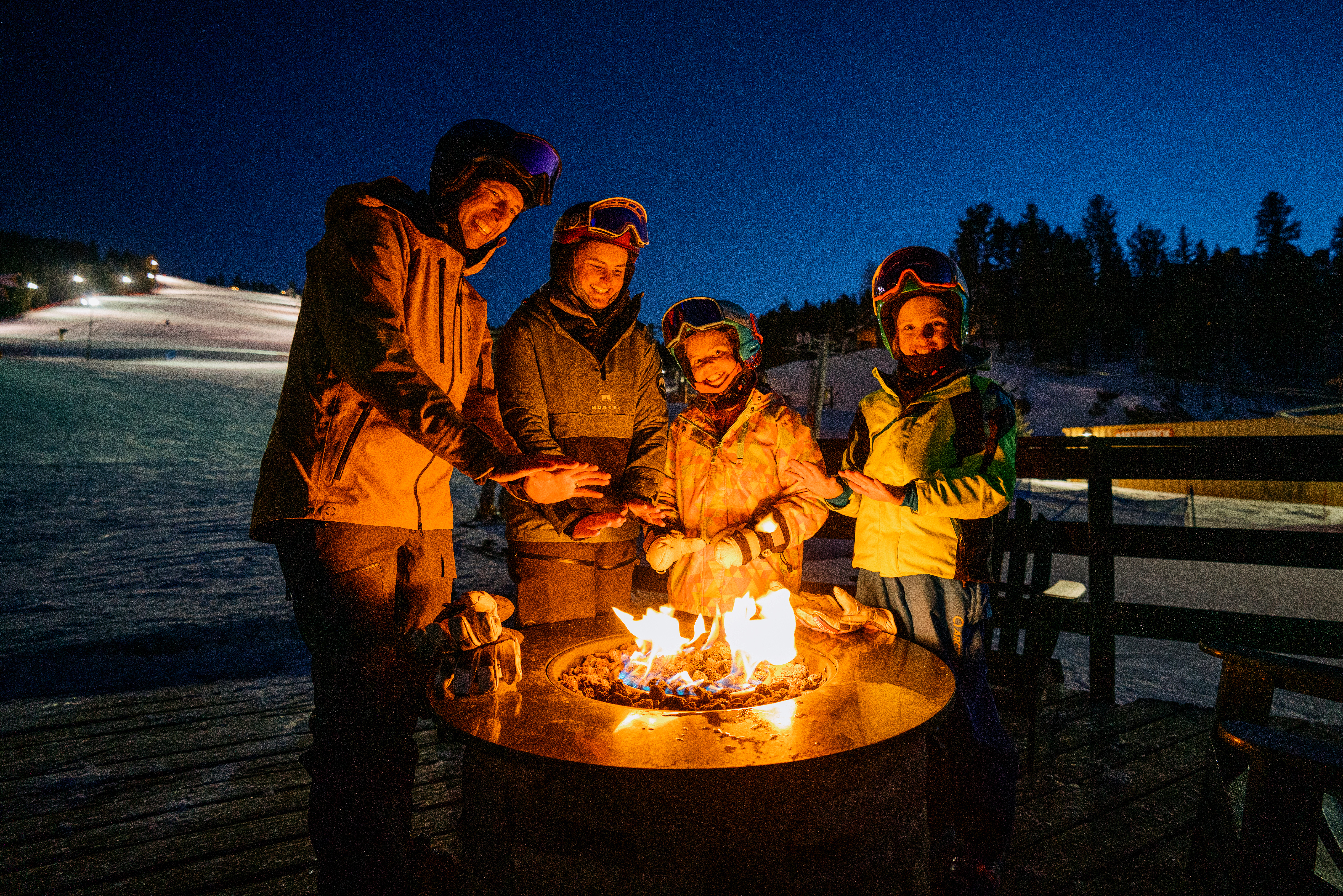 Family taking chairlift up Angel Fire Resort