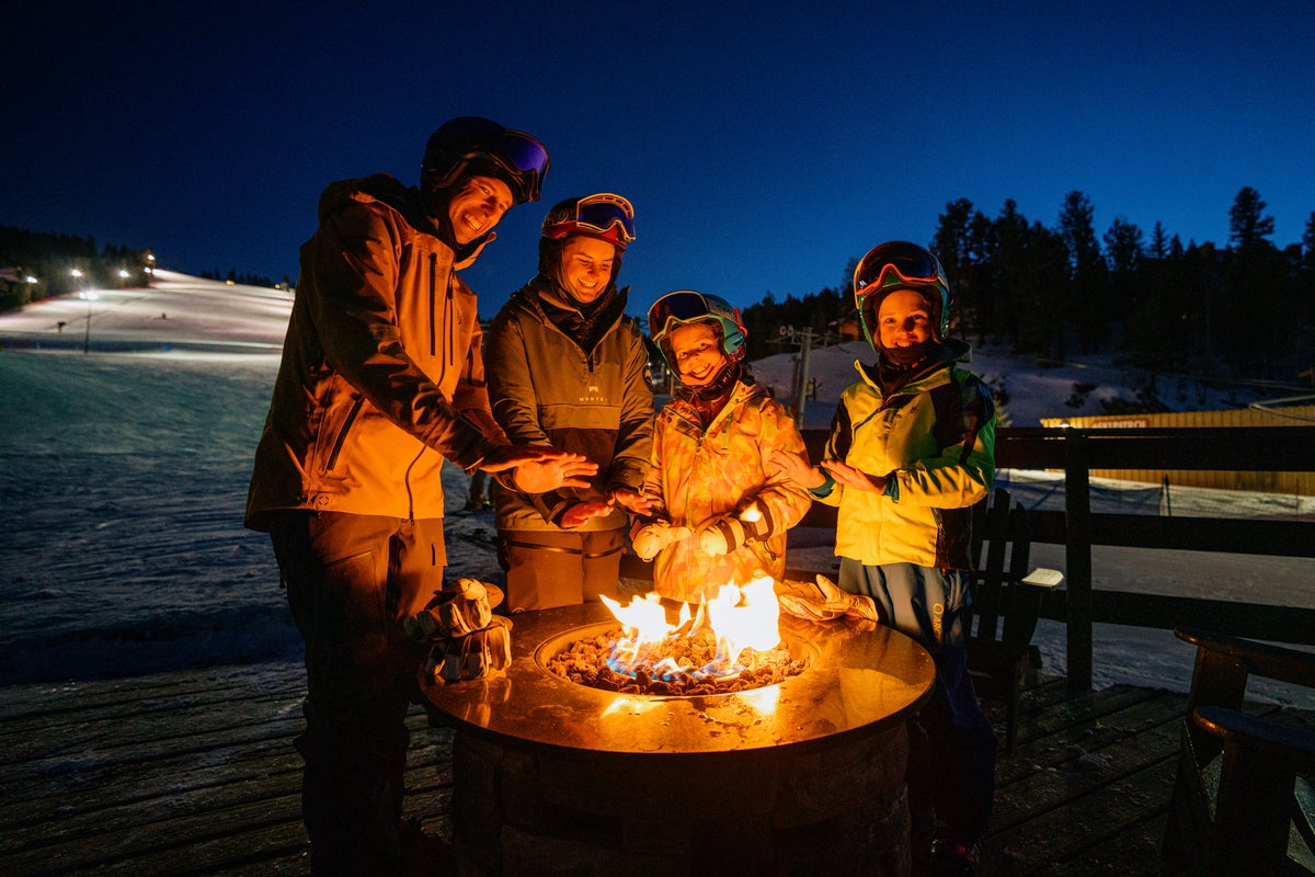 Family taking chairlift up Angel Fire Resort