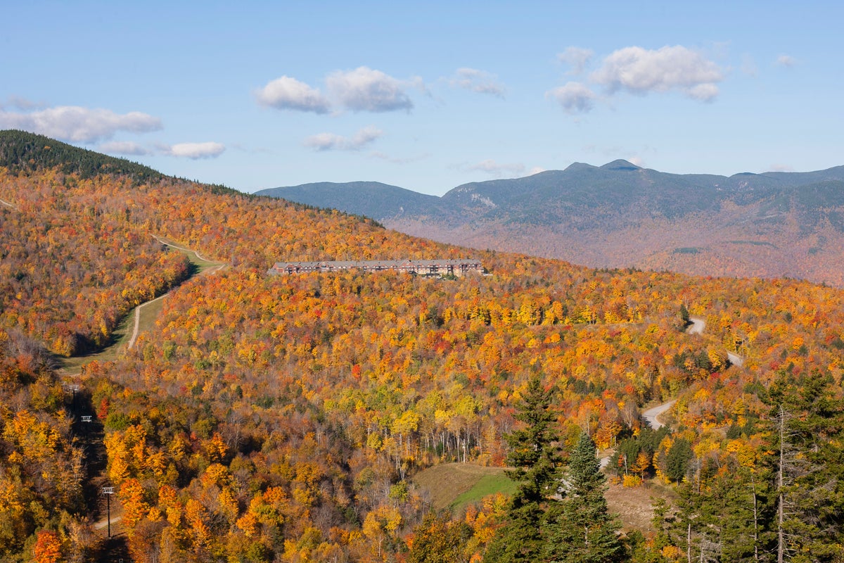 View of Sunday River's chairlifts and the valley below from atop the ski area