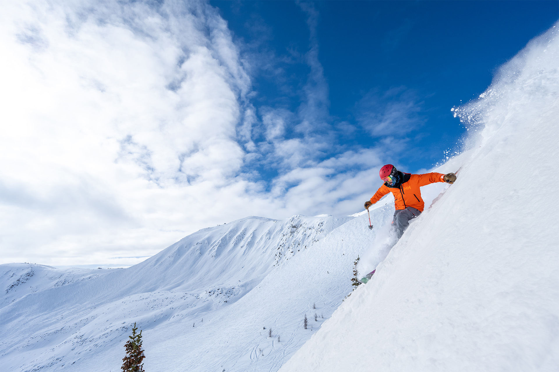 Bluebird day skiing at Whistler Blackcomb beneath the gondola