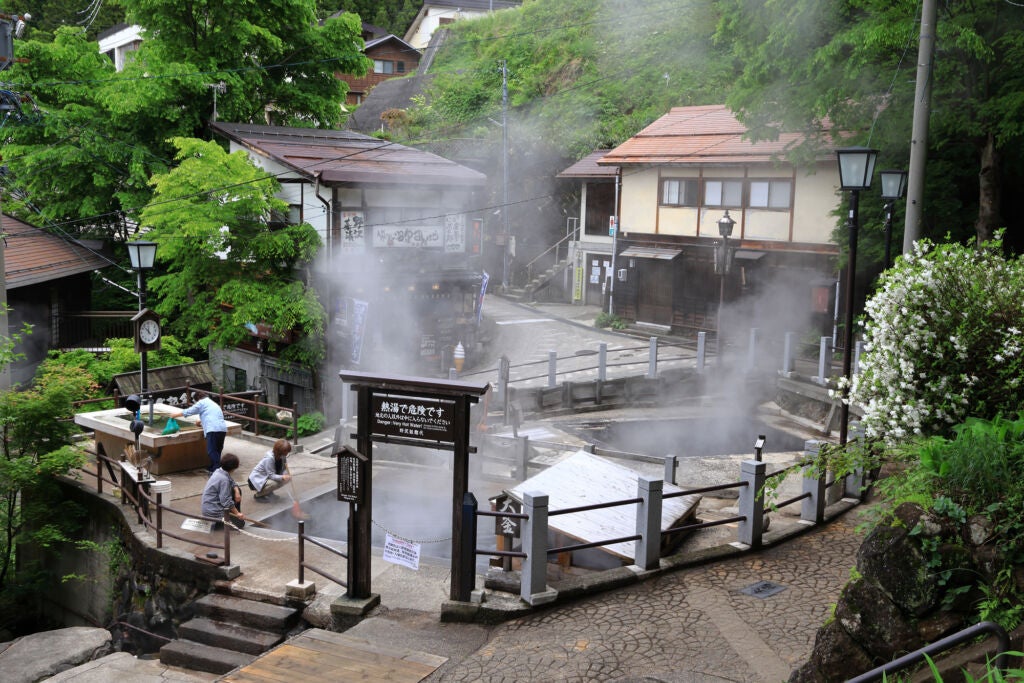 Steam hovering over hot springs at Nozawa Onsen