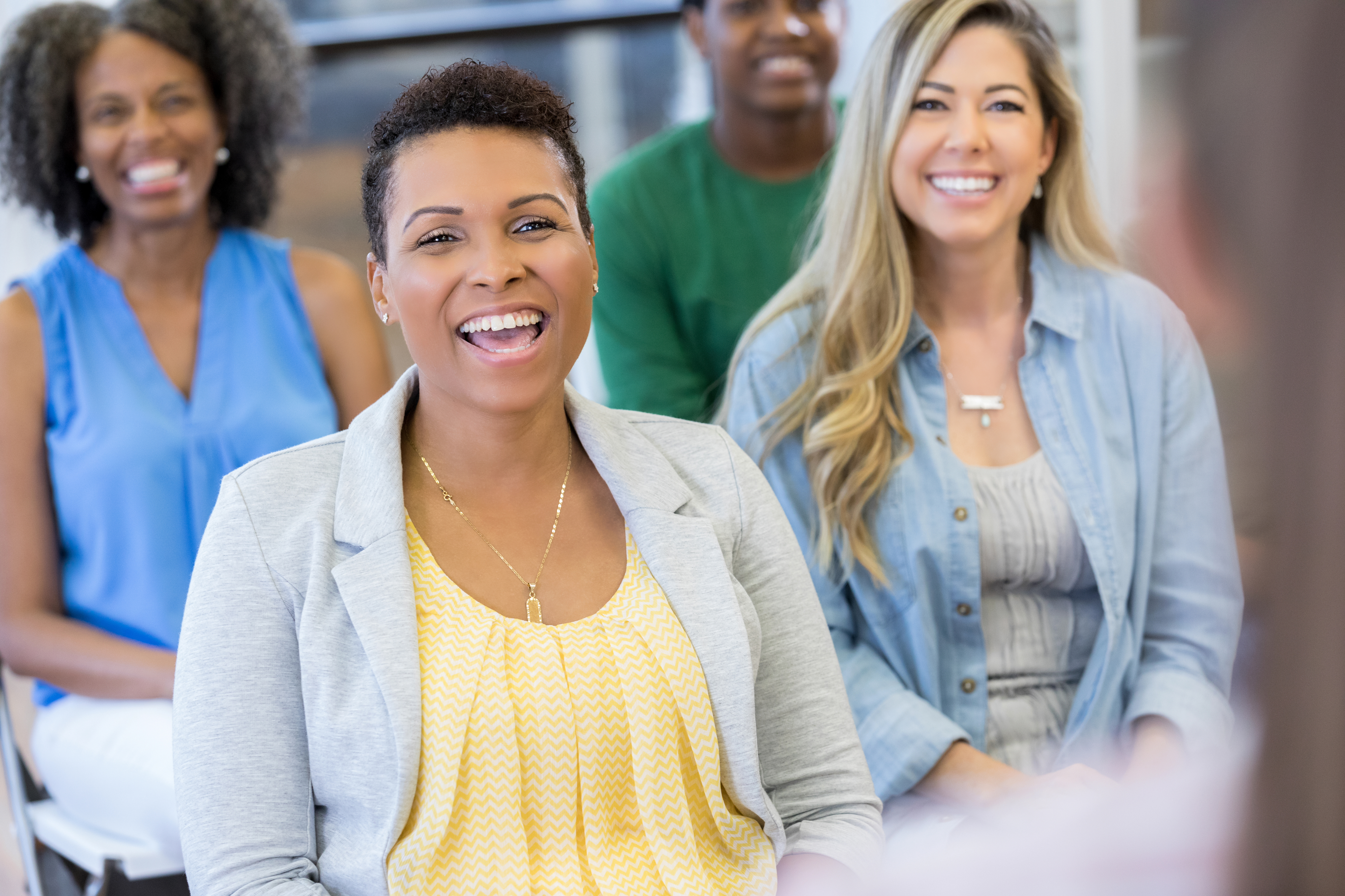 Group of women sitting at an event