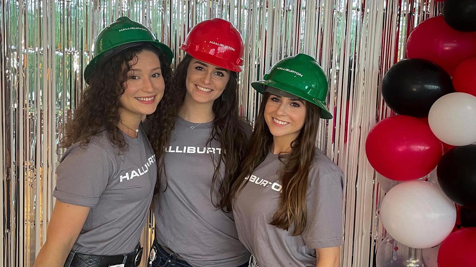 Group photo of three Halliburton interns.