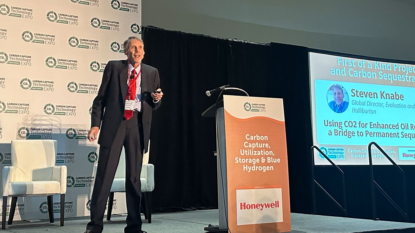 Halliburton's Steven Knabe on stage speaking at the CCUS Expo