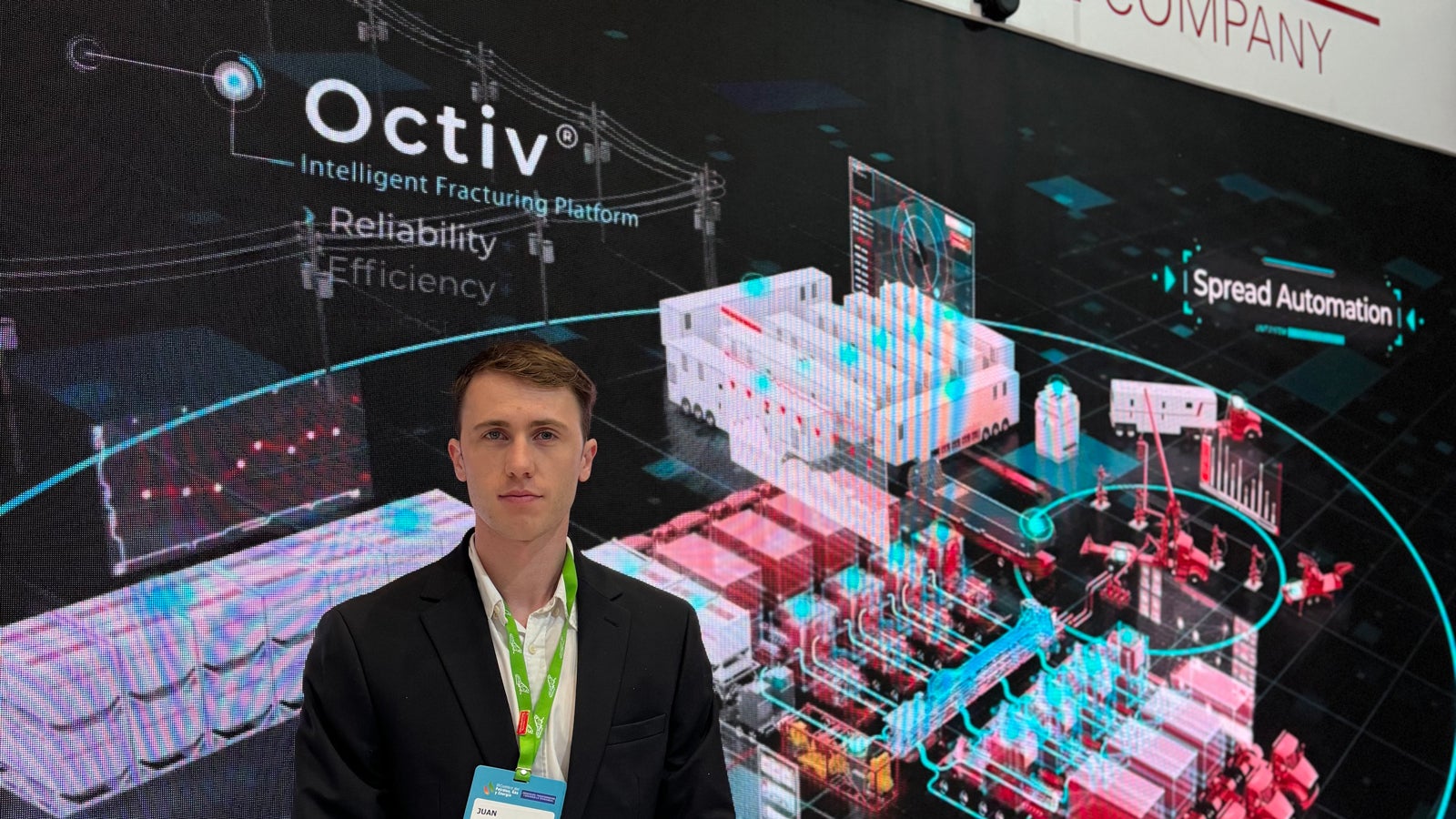 Halliburton employee. OCTIV digital fracturing services banner in the background.