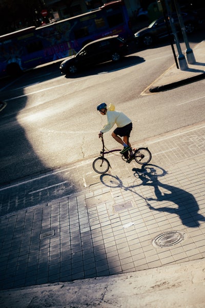 person riding electric p line brompton bike