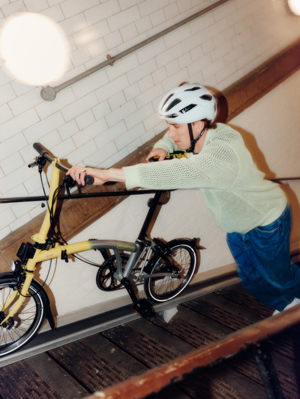 Palace Brompton folding bike going up a set of stairs