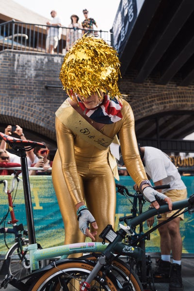 Person wearing gold outfit at the BWC