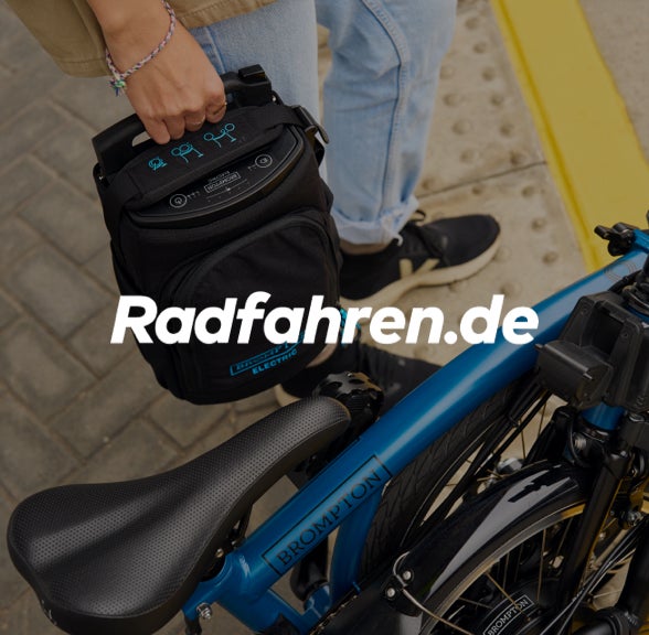 Radfahren.de logo over an image of a folded brompton electric c line in bolt blue
