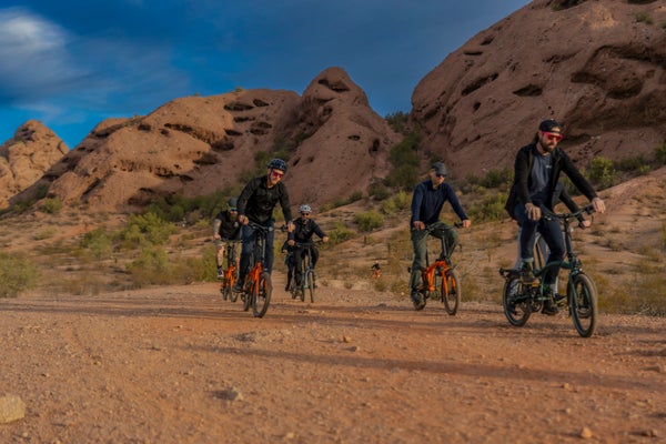 People riding the G Line bike in Arizona