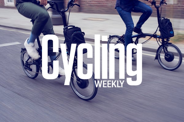 Cycling weekly logo in white over Brompton bicycle