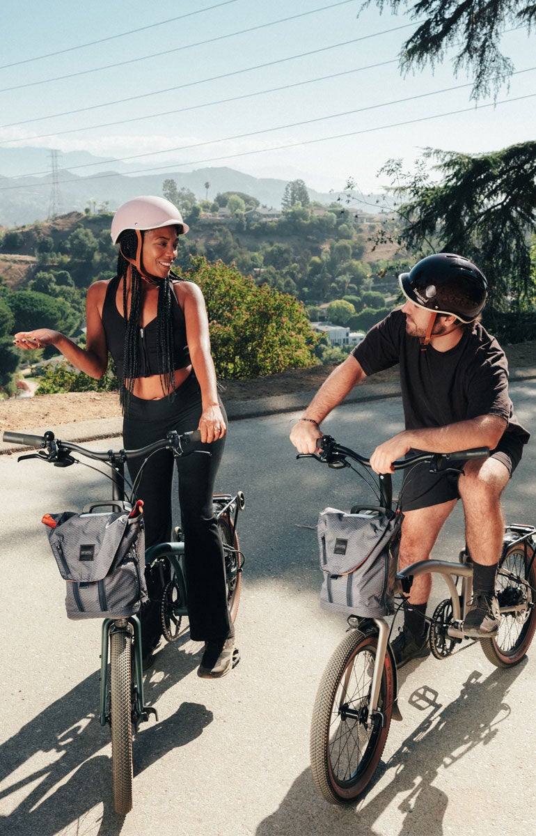 Two people sat on Brompton G Line bikes