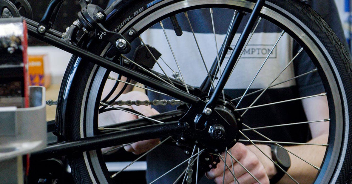Man working on bike in workshop