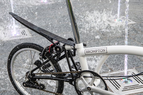 Brompton Flex-Mudguard set in the rain protecting the Brompton A Line folding bike