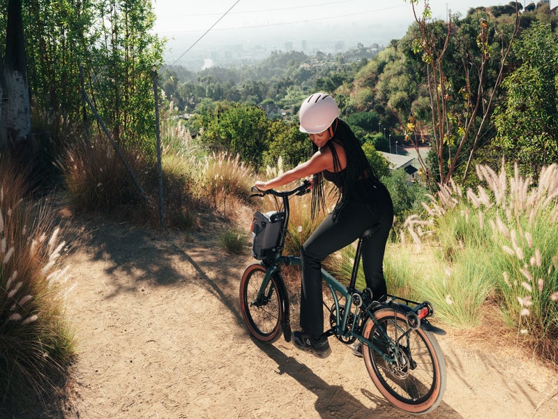 Person sat on G Line bike