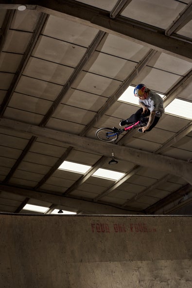 Kieran Reilly doing a jump on a Brompton bike