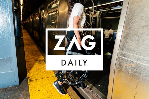 zag daily logo in white over Brompton bicycle