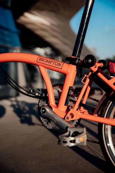 Partial image of Orange folding bike