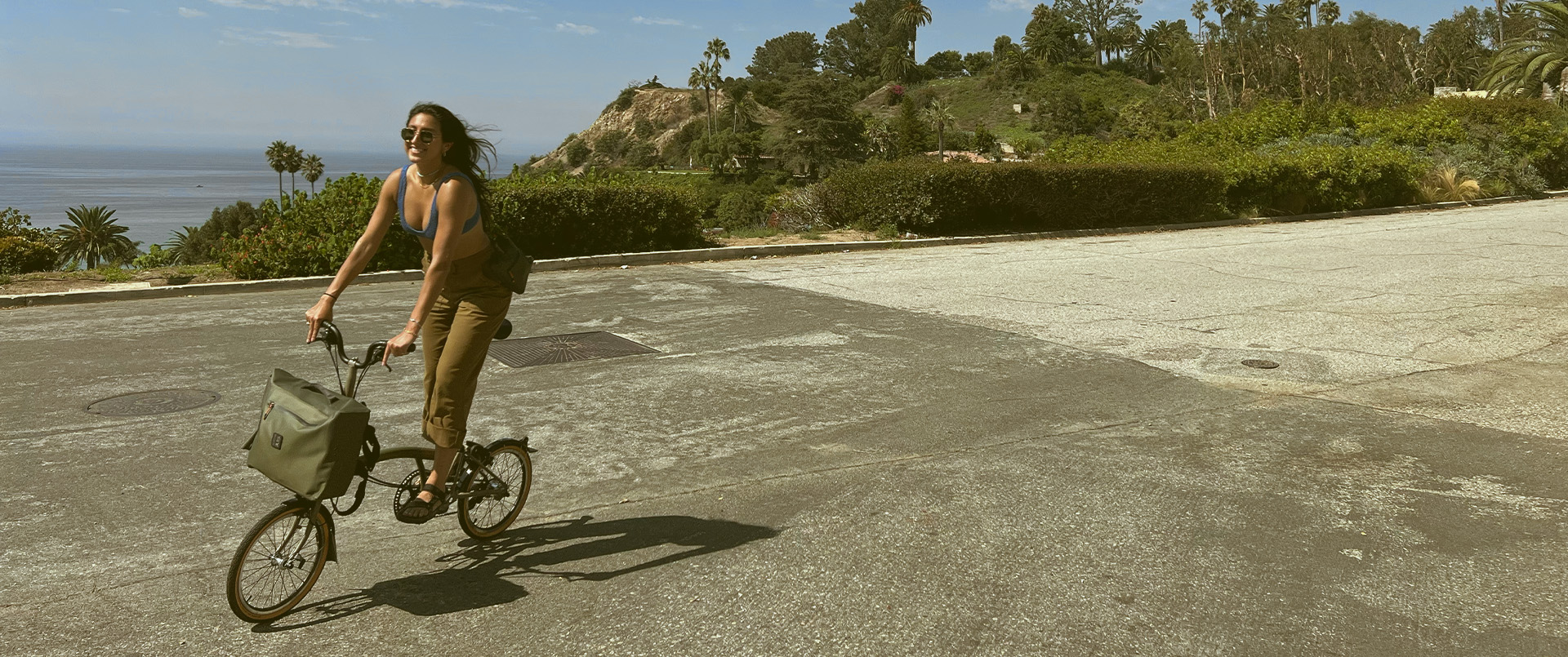 Diandra Esparza riding her Brompton x Bear Grylls folding bike