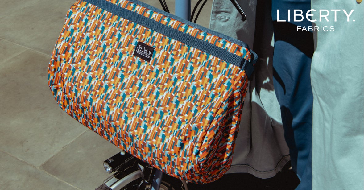 a model with the Brompton backpack made with Liberty Fabric