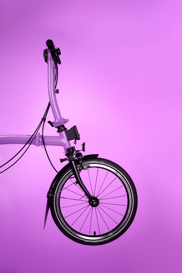 brompton pop lilac bike in front of lilac background