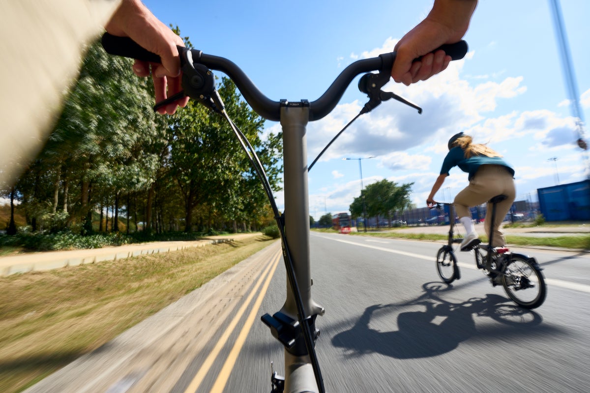 POV shot of someone riding a brompton t line folding bike