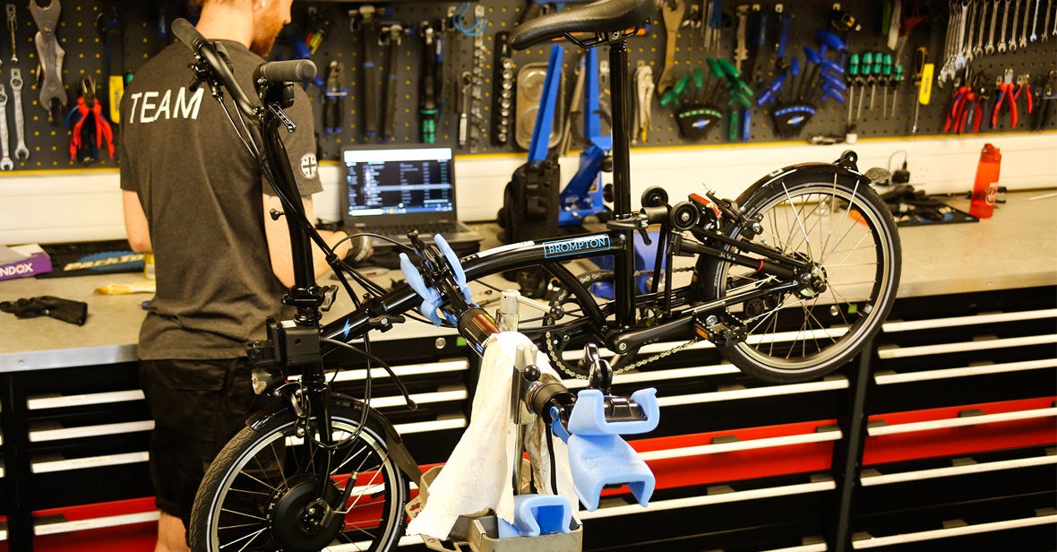 Man working on bike in workshop
