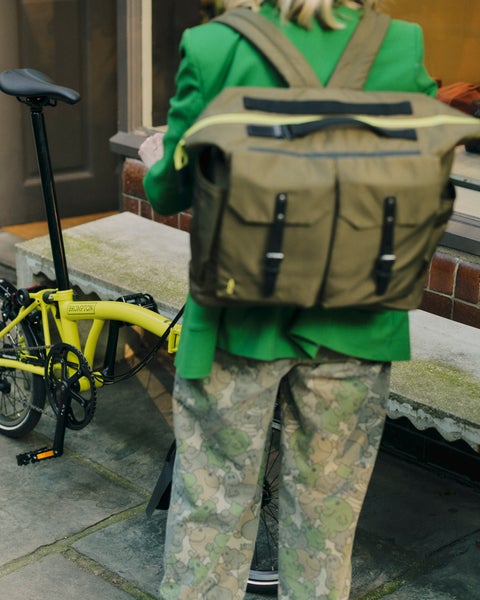 Person wearing Brompton x Ally Capellino backpack