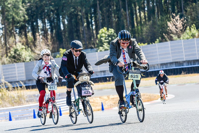 People racing on Brompton bicycles at the Brompton World Championship.