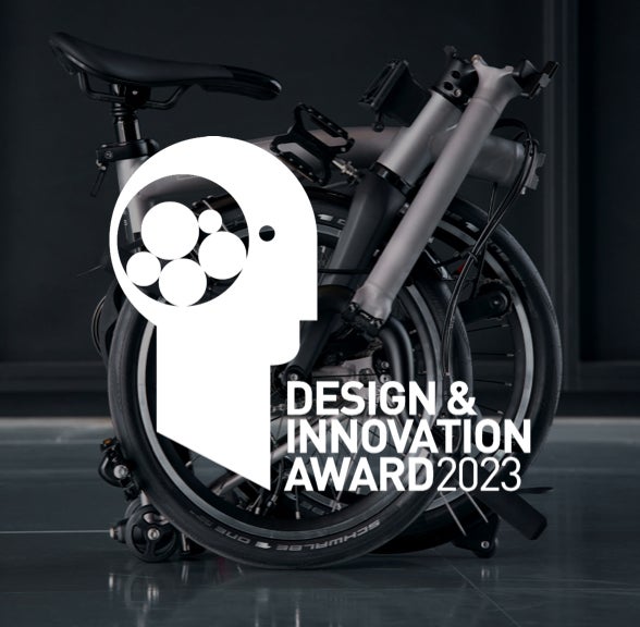 Design and Innovation Award 2024 logo over a folded Brompton T Line