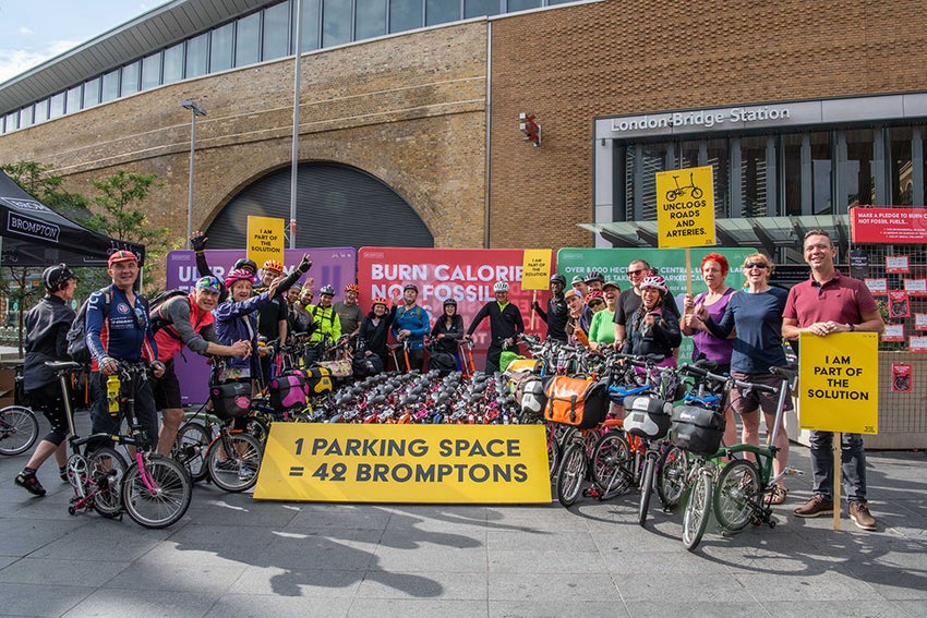 Brompton riders and activists at protest outside London Bridge station