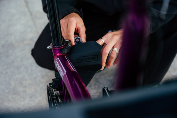 Close up of person with Brompton pouch