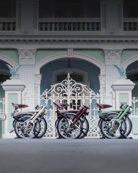 Three Brompton Classic Edition bikes