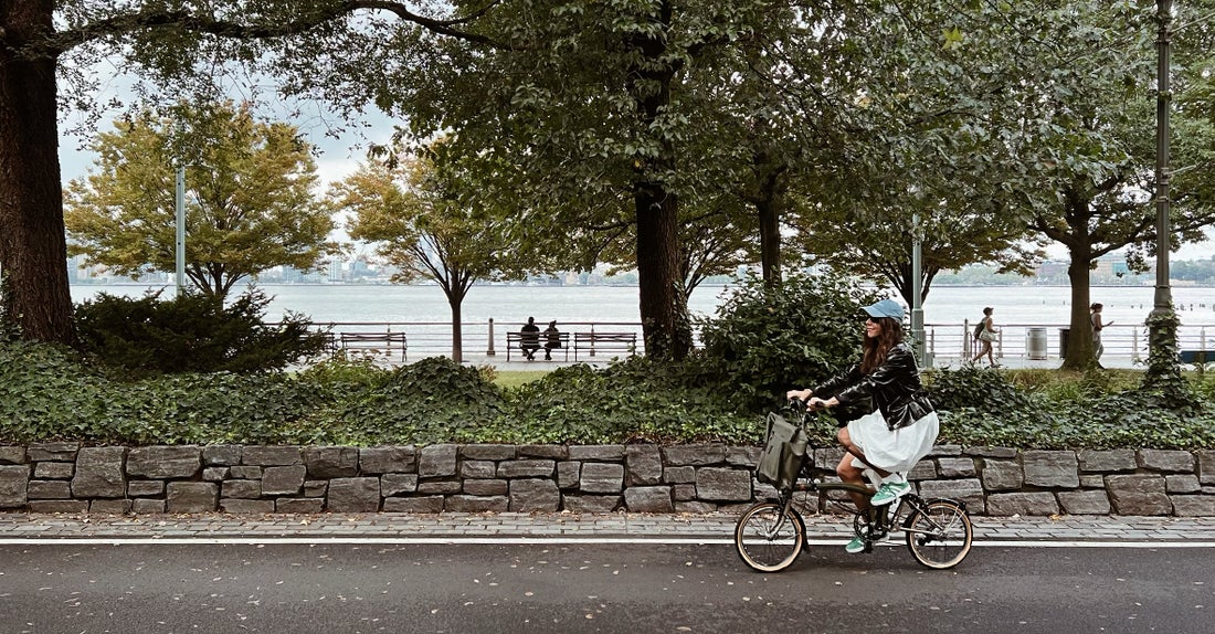 Nicole Berrie riding her Brompton x Bear Grylls folding bike in NYC