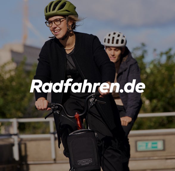Radfahren.de logo over image of two people cycling Brompton Electric P Line bikes