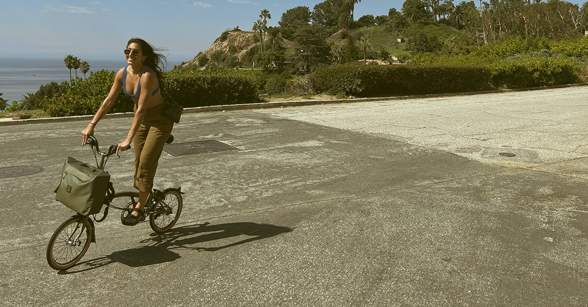 Diandra Marizet Esparza riding her Brompton x Bear Grylls folding bike