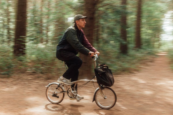 Person on Brompton x Barbour bike