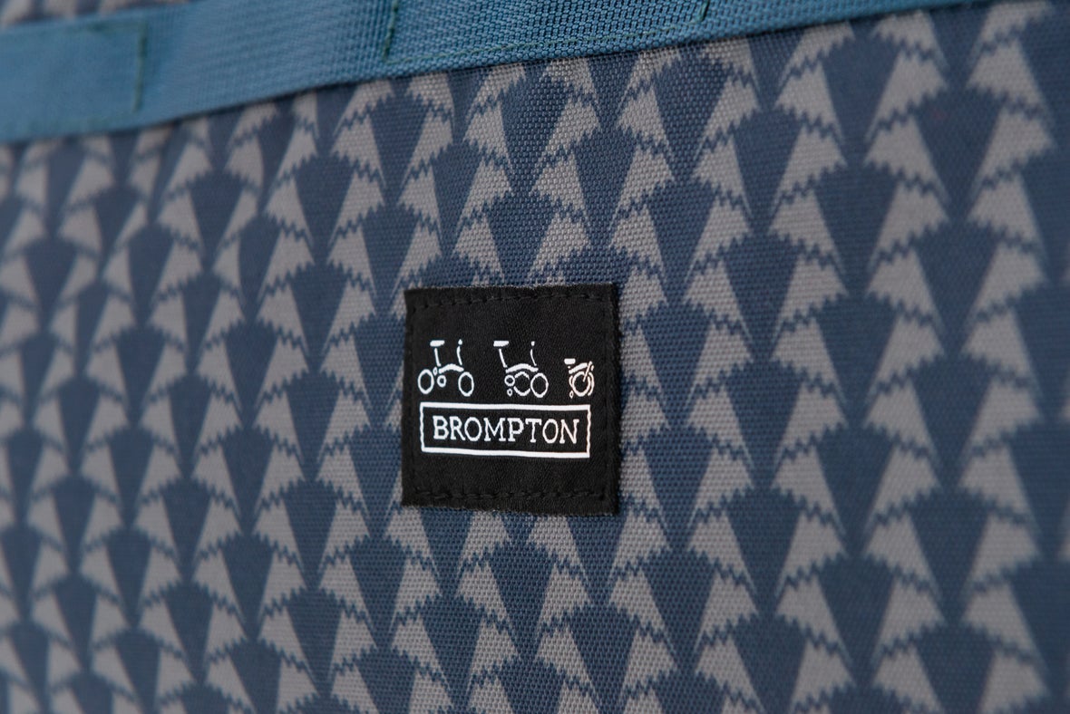 a close up of a Brompton bag made with Liberty fabric in the Jonathan pattern