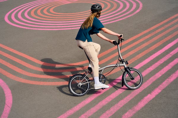 person riding  a brompton t line